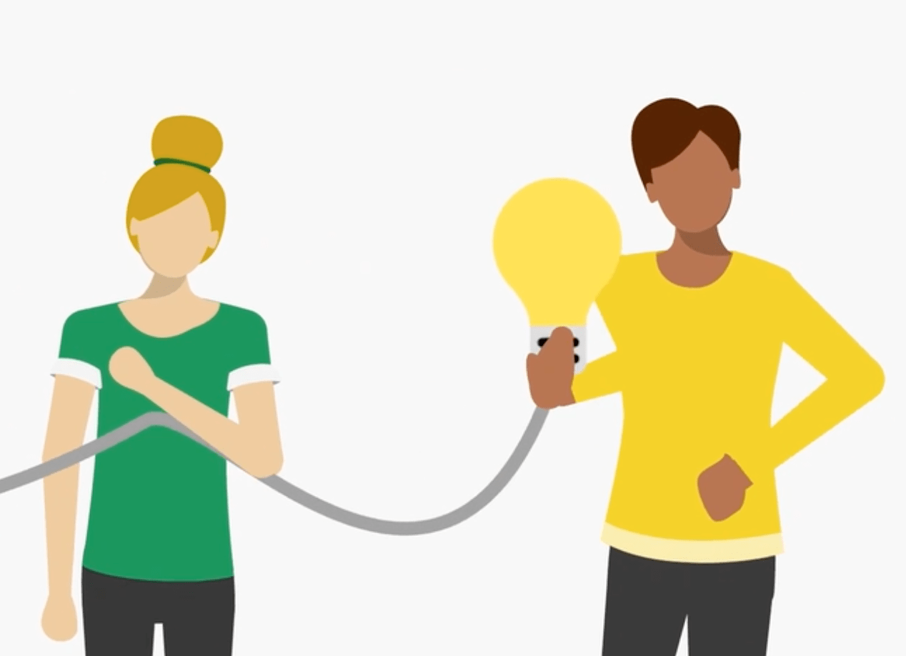 girl dressed in green and man drressed in yellow holding a lightbulb icon